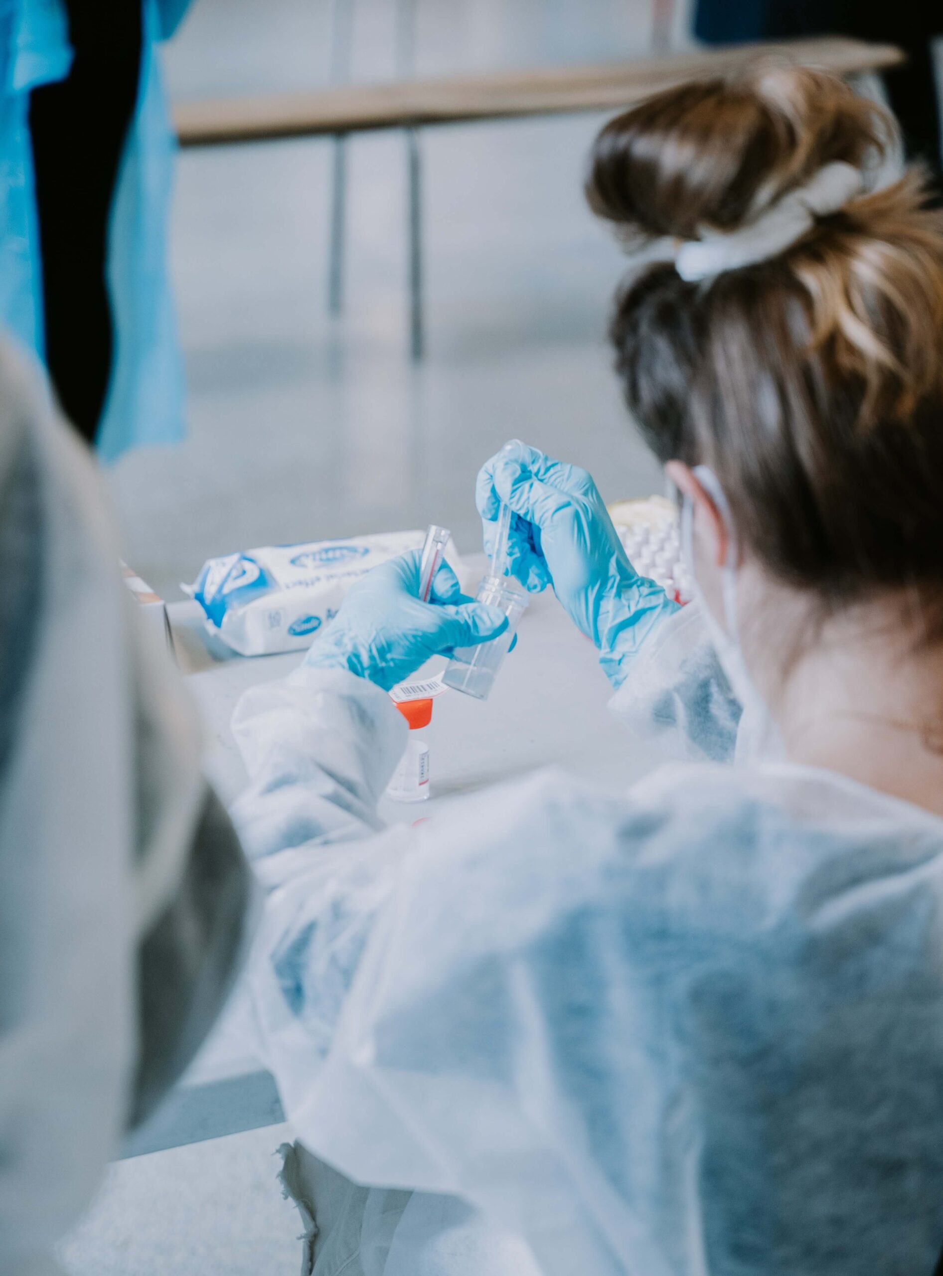 Lab woman holding test tube